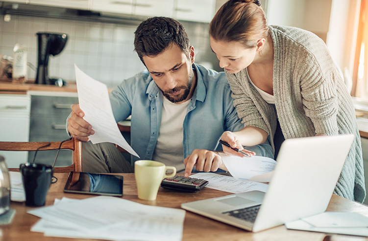 couple looking over banking information