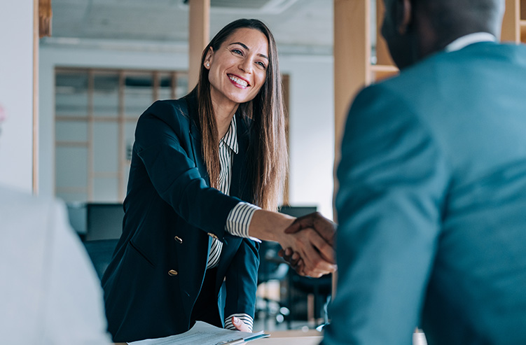 lady and man shaking hands