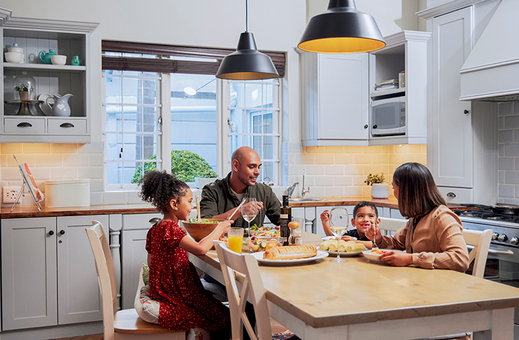 family sitting at the kitchen table