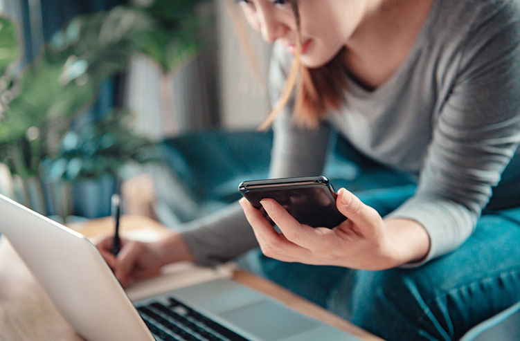 lady using phone for mobile banking